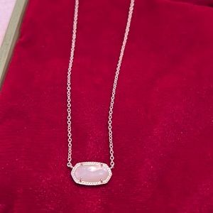 Kendra Scott adjustable gold tone necklace with faceted white stone.